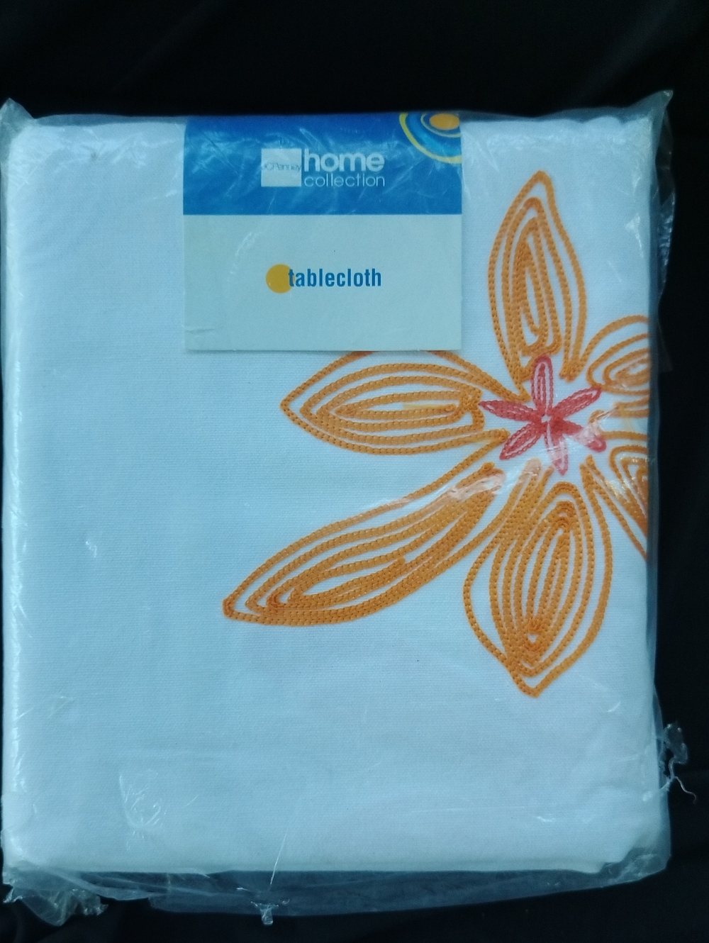 Home Collection tablecloth features large embroidered Flowers